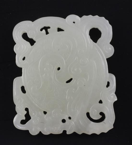 A Chinese archaistic white jade dragon pendant, 6cm